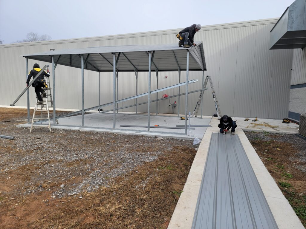 Men working on picnic shelter