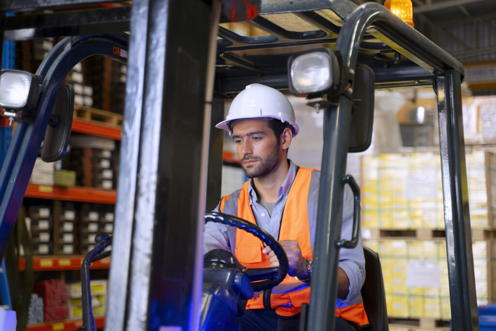 Man operating Forklift