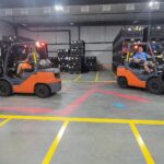 two forklifts