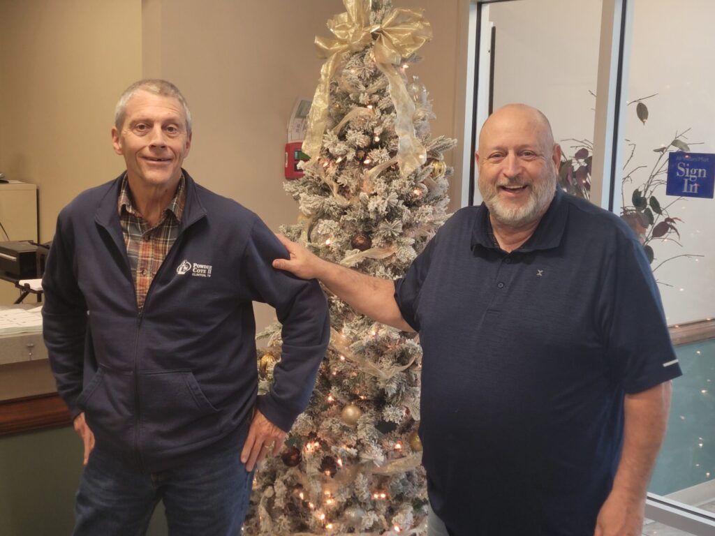 Tom Ewton and Greg Seiber by Christmas Tree 2024