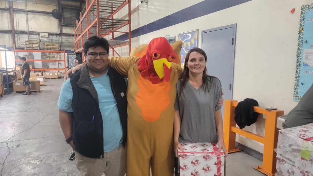 Associates receiving their turkeys at the Powder Cote II of Tennessee Turkey Giveaway