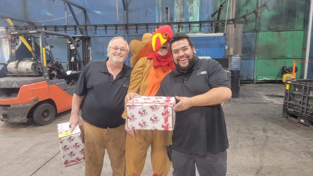 Smiling team members at the 19th Annual Powder Cote II of Tennessee Turkey Giveaway